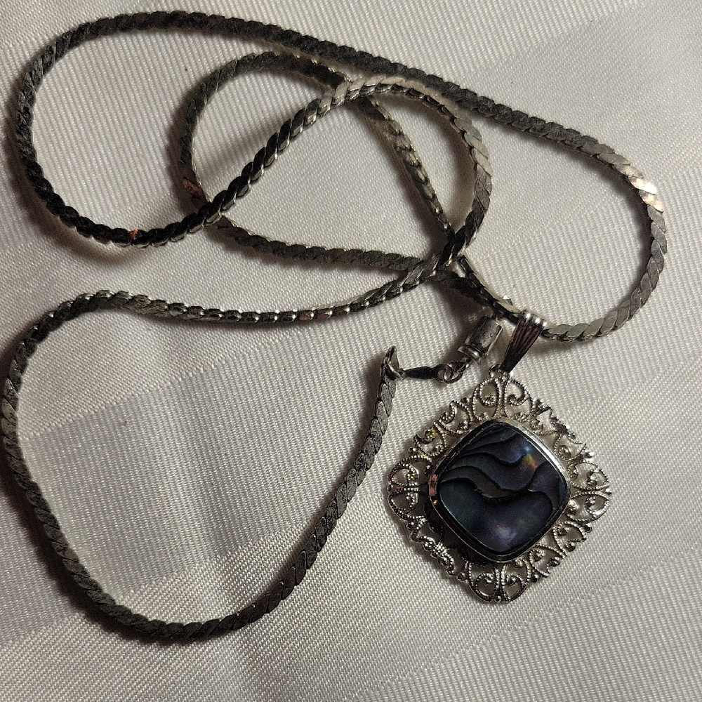 Elegant Silver Necklace with Blue Pendant